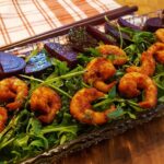 A photo of shrimps and beetroot