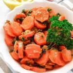 A picture of Moroccan carrot salad with parsley and lemon.