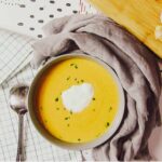 Carrot and ginger soup in a bowl.