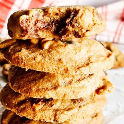 Stacked keto peanut butter chocolate chip cookies.