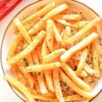 A plate of chips seasoned with some homemade chip spice.