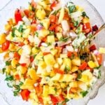 An overhead shot of mango, pineapple and habanero salsa.