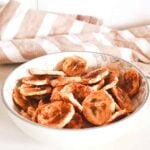 A bowl of air fryer dehydrated banana chips.