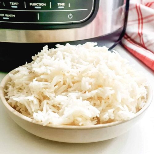 A picture of basmati rice and the Ninja Foodi Air Fryer