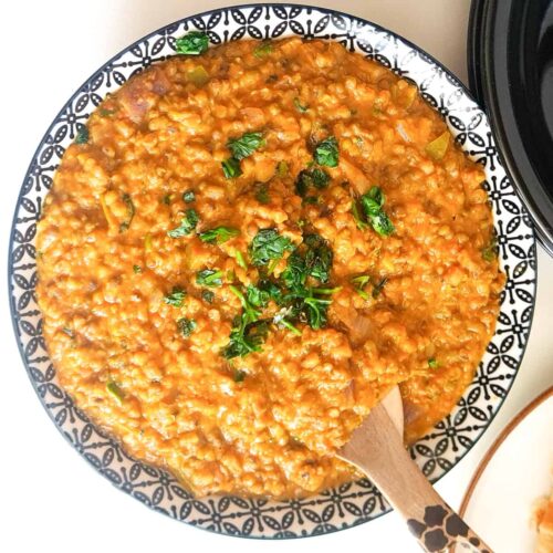 A bowl of ndengu garnished with coriander.