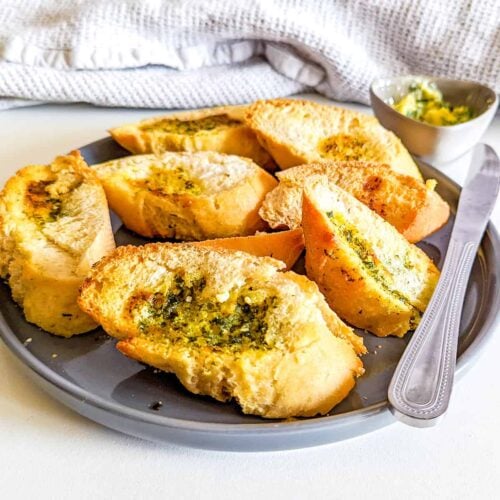 A plate of air fryer garlic bread cooked from frozen.