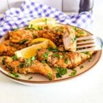 A plate of air fried chicken tenders.