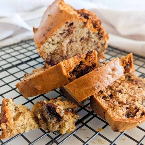 Banana bread on a wire cooling rack.