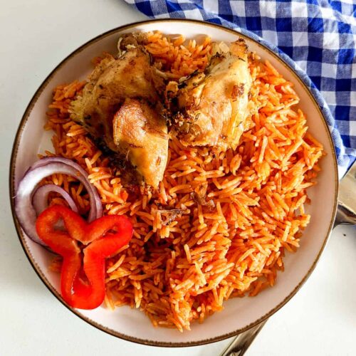 A plate of Jollof rice with chicken