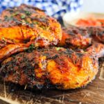 Kuku choma on top of a chopping board
