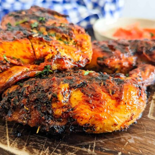 Kuku choma on top of a chopping board