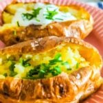 Air Fryer Baked Potatoes on a plate.