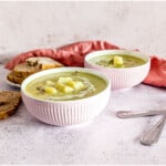 Two bowls of potato and leek soup made using the soup maker.