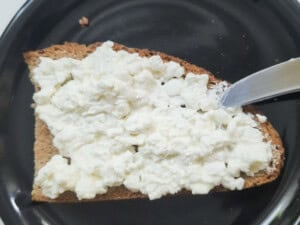Cottage cheese spread on top of toast.