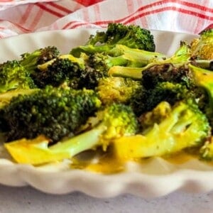 Crispy air fried broccoli served on a plate.