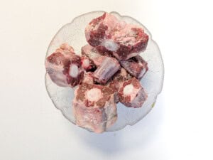 Season oxtail